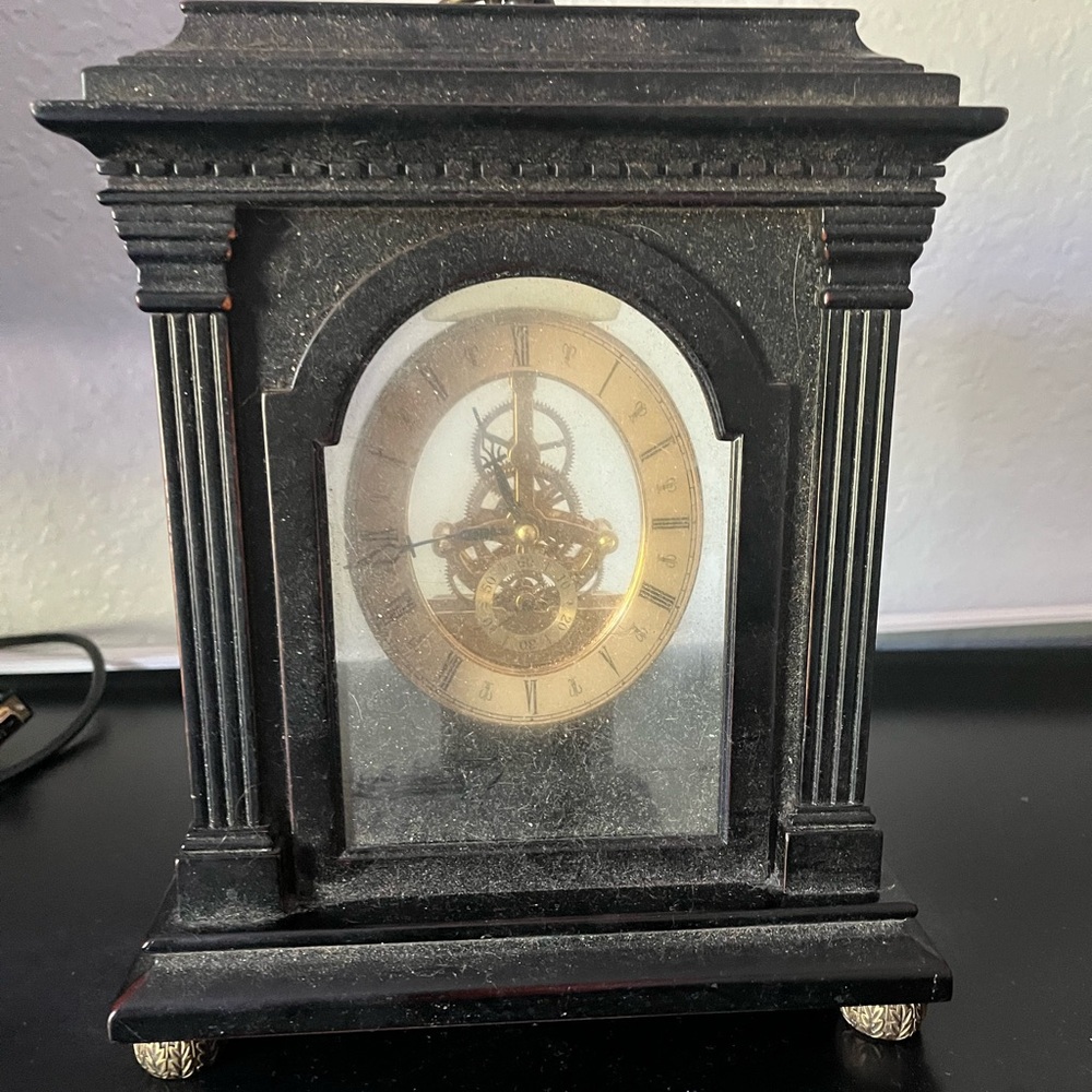 Elegant Black and Gold Mantel Clock